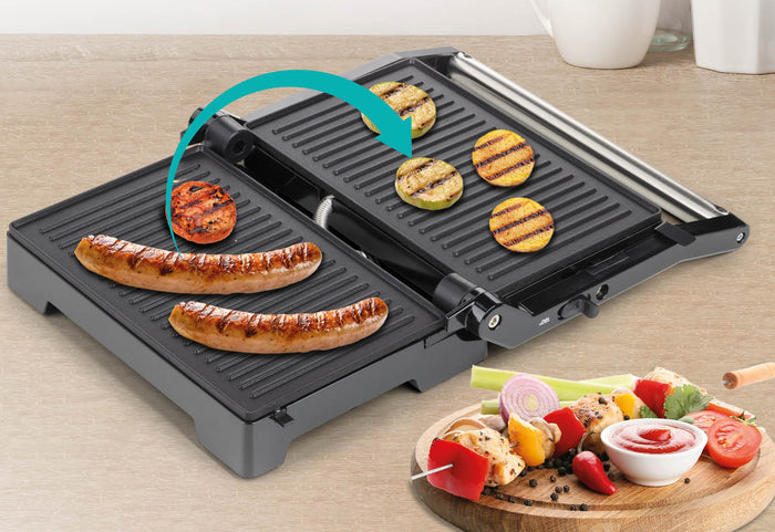 Otvára sa do 180°, čím sa zväčšuje plocha na grilovanie.